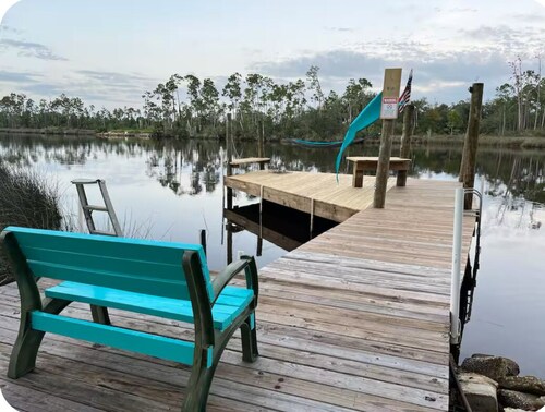 Manatee Cove on the waterway with 5 acres. Pet Friendly. 5 minutes to the beach!
