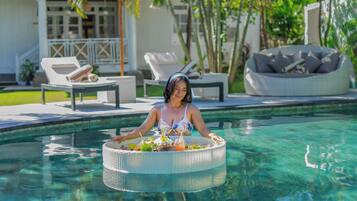 Outdoor pool, pool umbrellas, pool loungers
