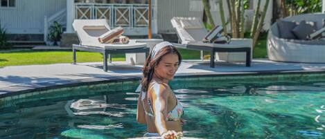 Outdoor pool, pool umbrellas, pool loungers