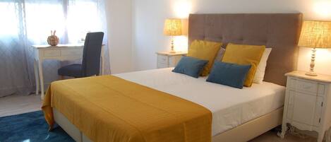 1 bedroom, desk, iron/ironing board, bed sheets