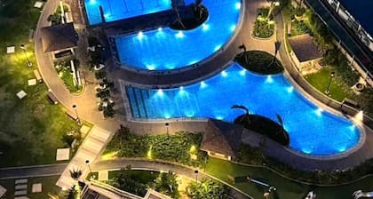 Cozy 2BR Condo Unit. Situated at the heart of metropolitan CBD's and Malls.