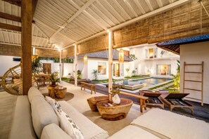 Deluxe Villa, 6 Bedrooms, Private Pool, Pool View | Living area | 32-inch Smart TV with digital channels - Villa Passion by Alfred in Bali (Seminyak)