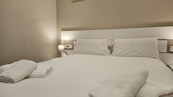 3 dormitorios, tabla de planchar con plancha, wifi gratis y ropa de cama