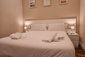 3 dormitorios, tabla de planchar con plancha, wifi gratis y ropa de cama