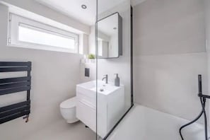 Hair dryer, towels, toilet paper