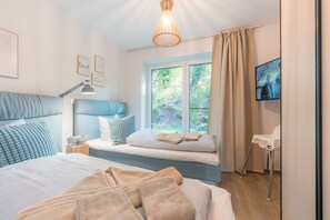 2 bedrooms, iron/ironing board, travel crib, free WiFi