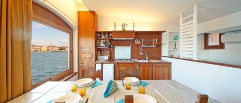 Apartment | Living area | 32-inch flat-screen TV with digital channels