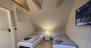 1 chambre, fer et planche à repasser, Wi-Fi gratuit, draps fournis