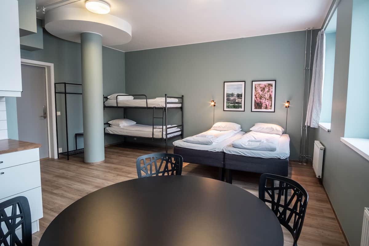 Quadruple Room | 1 bedroom, individually decorated, blackout drapes, free WiFi