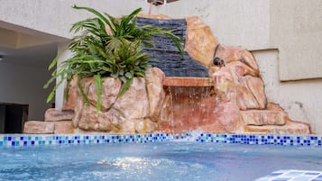 Outdoor pool, free pool cabanas, pool umbrellas