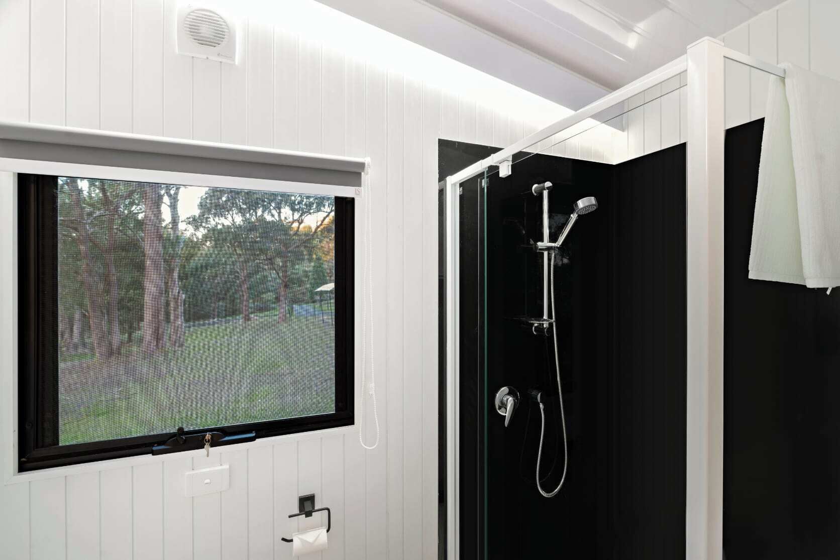 Shower, hair dryer, towels, shampoo