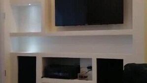 Smart TV, chimenea, estéreo y impresora 