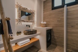 Shower, rainfall showerhead, hair dryer, towels