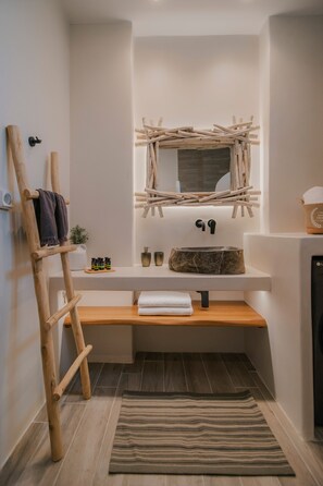 Shower, rainfall showerhead, hair dryer, towels