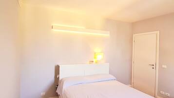 1 chambre, fer et planche Ă repasser, lit parapluie, draps fournis