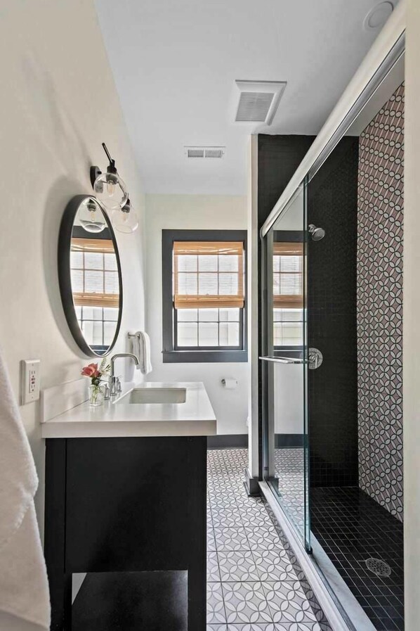 Shower, hair dryer, towels