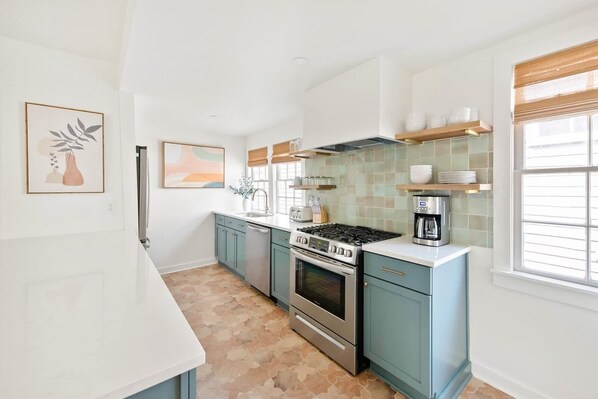 Fridge, microwave, oven, stovetop - The OakTree | Newly Renovated 2BR Downtown Haven! (Charleston)