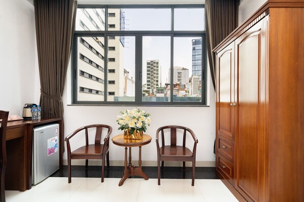 Premier Room, 1 Queen Bed, City View | Egyptian cotton sheets, premium bedding, down duvets, memory-foam beds - Hoang Luxury Hotel Dist 1 Ho Chi Minh (Ho Chi Minh City)