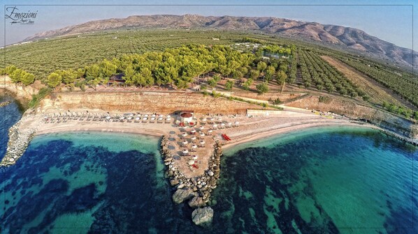 Private beach nearby, black sand, sun loungers, beach umbrellas