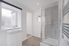 Shower, hair dryer, shampoo