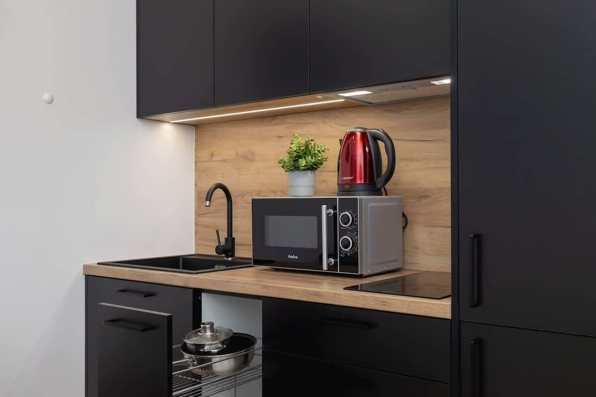 Fridge, microwave, stovetop, cookware/dishes/utensils