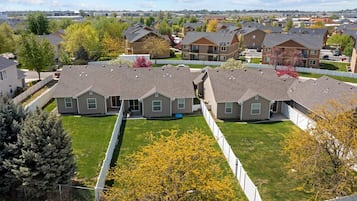 View of all 3 townhomes from the back yard.