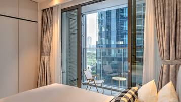 Desk, laptop workspace, blackout drapes, soundproofing