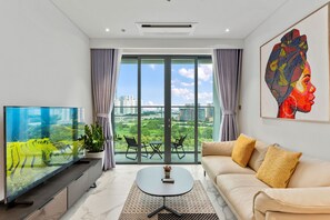 Apartamento Deluxe, 2 habitaciones, cocina, vistas a la ciudad | Zona de estar