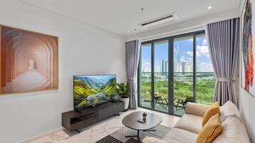 Deluxe appartement, 2 slaapkamers, keuken, uitzicht op stad | Woonruimte