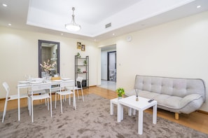 Apartamento família | Área de estar