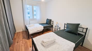 2 chambres, fer et planche à repasser, Wi-Fi, draps fournis