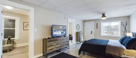 1 bedroom, desk, iron/ironing board, travel crib