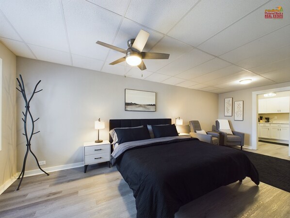 1 bedroom, desk, iron/ironing board, travel crib