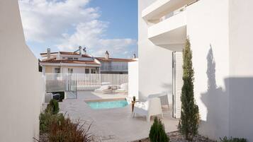 Outdoor pool, pool umbrellas, pool loungers