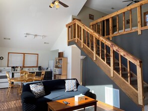 Comfort Chalet | Living area | 52-inch Smart TV with cable channels, streaming services - River Ridge Inn (Norfork)