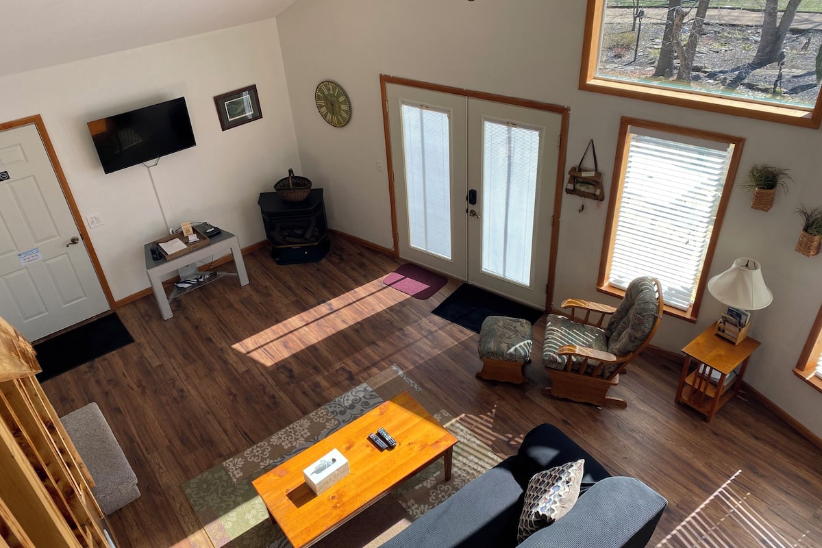 Comfort Chalet | Living area | 52-inch Smart TV with cable channels, streaming services