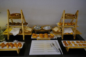 A buffet table with various baked goods and pastries. - Zemi Hotel Cappadocia (Nevsehir)