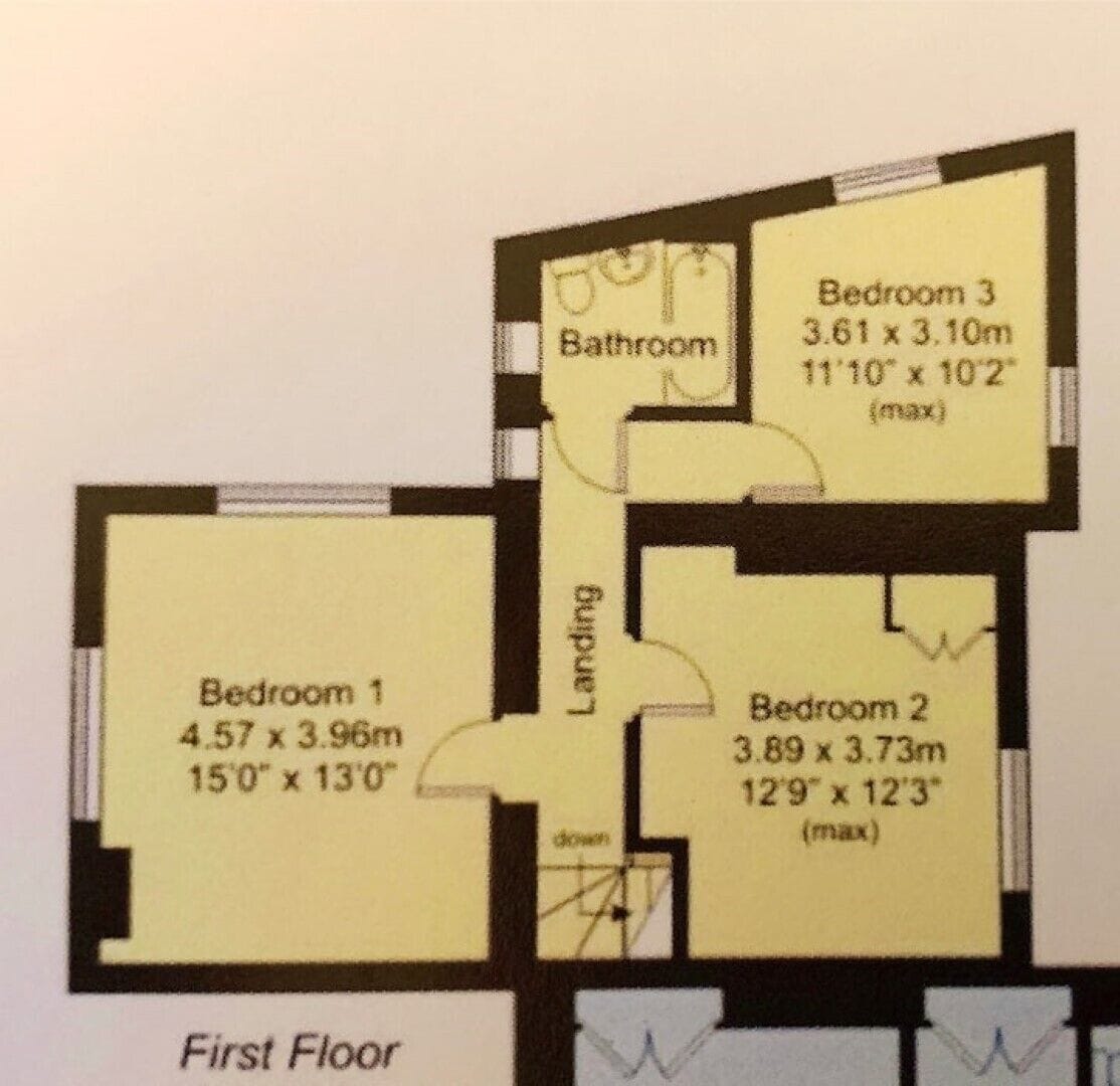 A first-floor floor plan with three bedrooms, a bathroom, and a landing area.