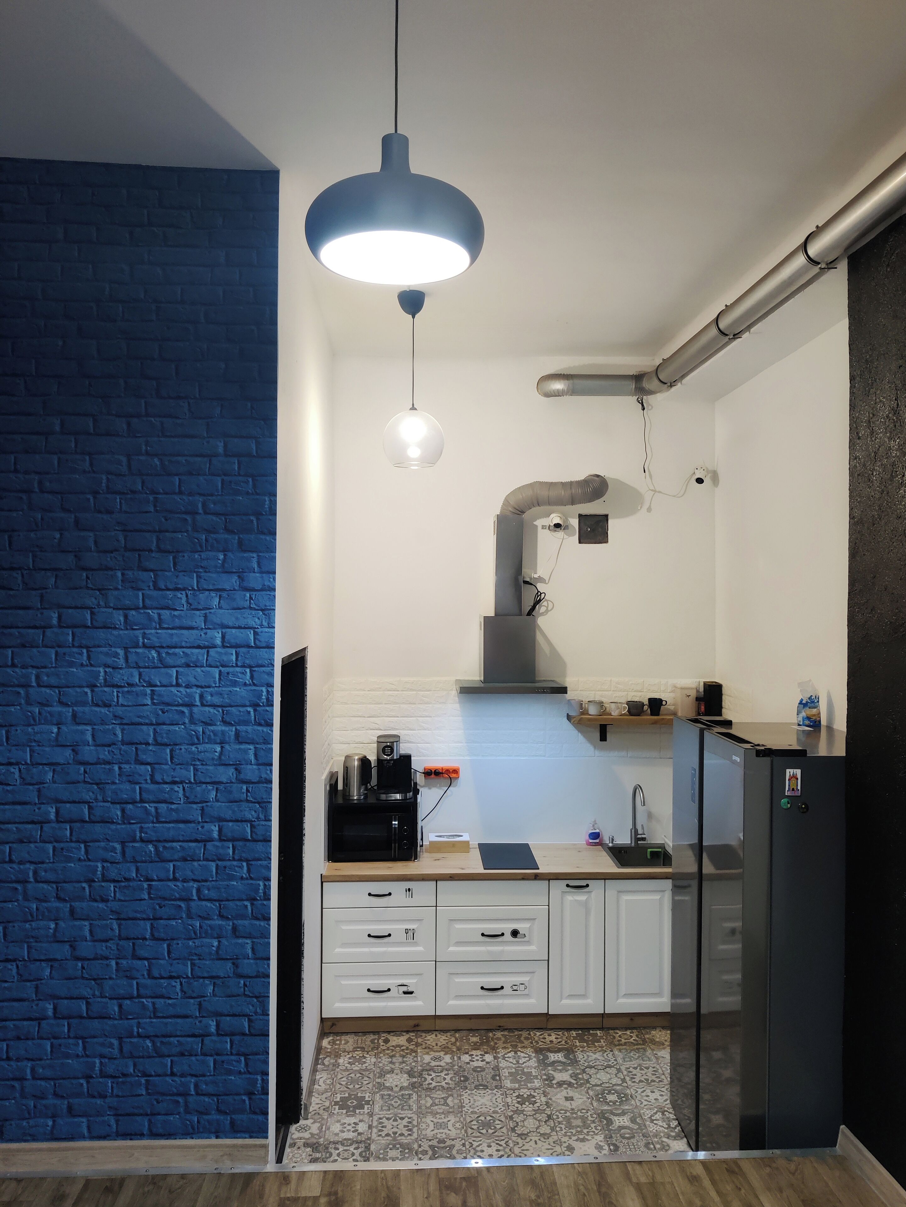 Full-size fridge, microwave, stovetop, griddle