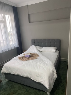 Premium bedding, desk, soundproofing, bed sheets
