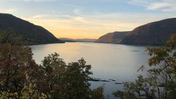 A serene lake surrounded by hills.