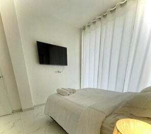 2 habitaciones, tabla de planchar con plancha y wifi gratis 