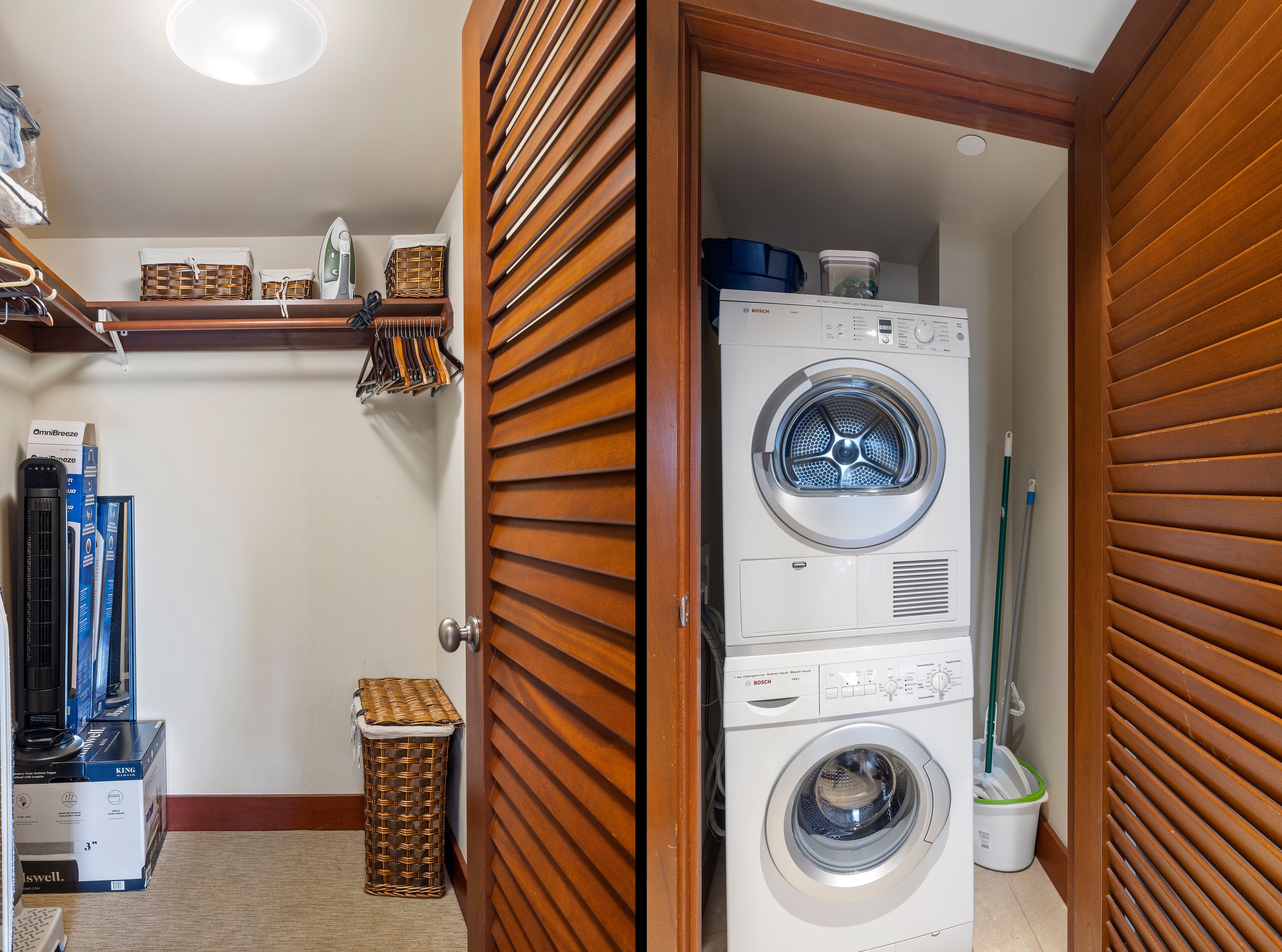 A compact laundry room with a front-loading Bosch washer and dryer, a wicker laundry basket, and a small trash bin.