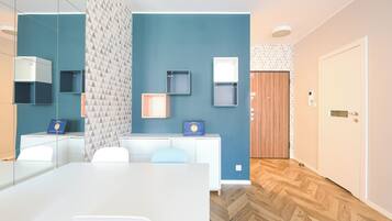 Comfort Studio Suite | Living area | 50-inch flat-screen TV with cable channels