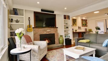 Smart TV, fireplace, DVD player, video library