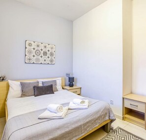 1 bedroom, desk, iron/ironing board, travel cot