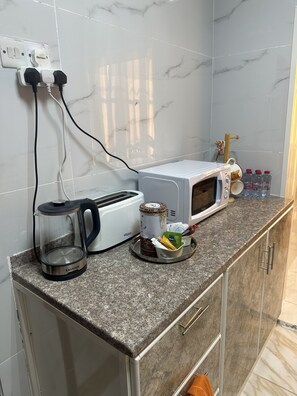 Fridge, microwave, oven, electric kettle