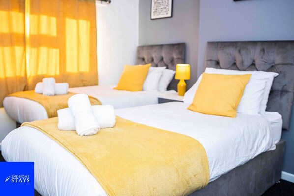 3 bedrooms, desk, iron/ironing board, travel cot