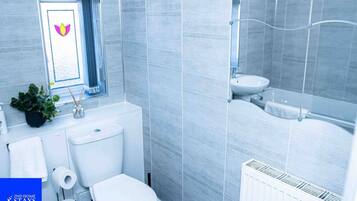 Eco-friendly toiletries, hair dryer, towels, soap