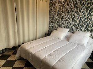 2 habitaciones, tabla de planchar con plancha, cuna de viaje y wifi 